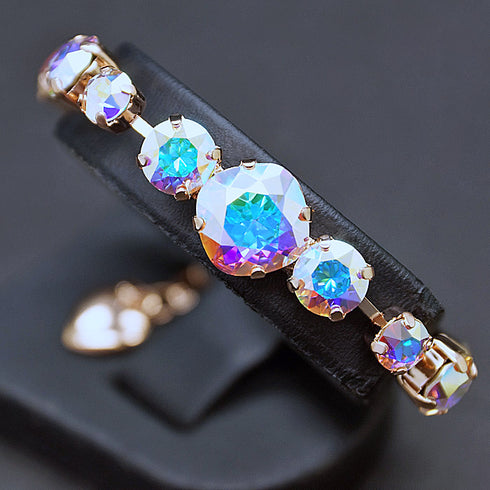 Aproce "Apžilbinošs Mirdzums II (Aurore Boreale)" ar Swarovski™ kristāliem